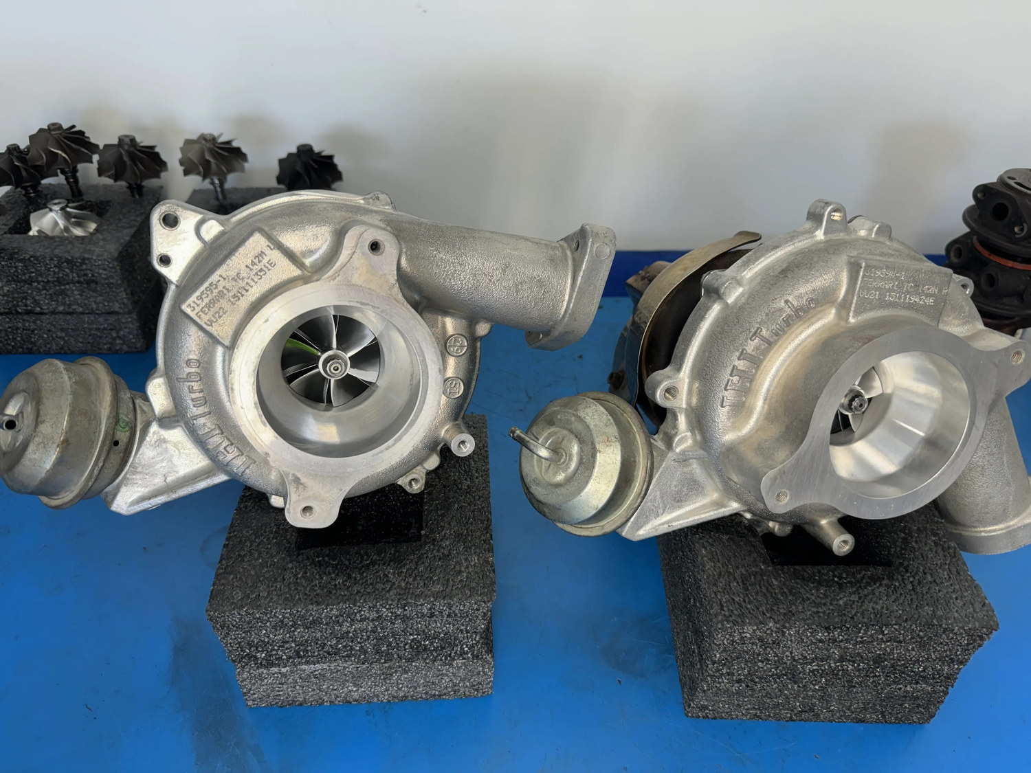 Ferrari turbochargers lined up during rebuild documentation