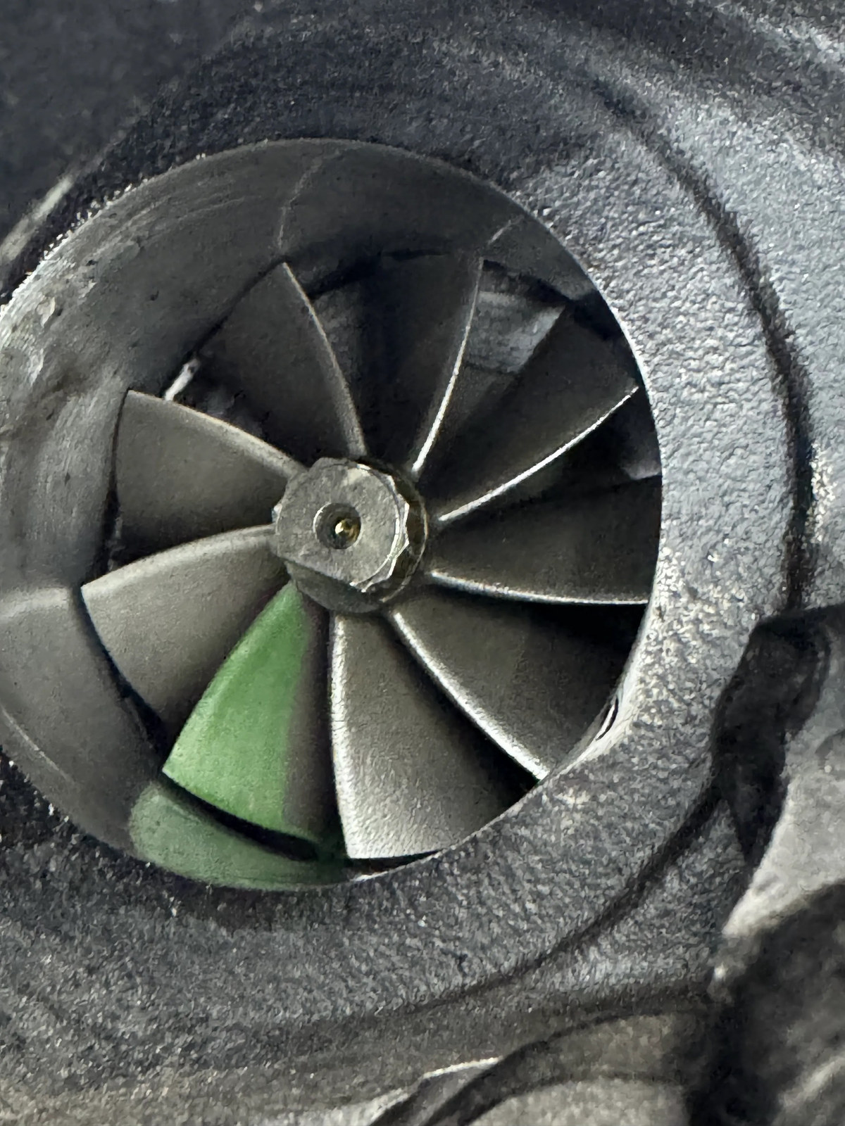 Ferrari 488 turbine wheel documented during inspection - exhaust die